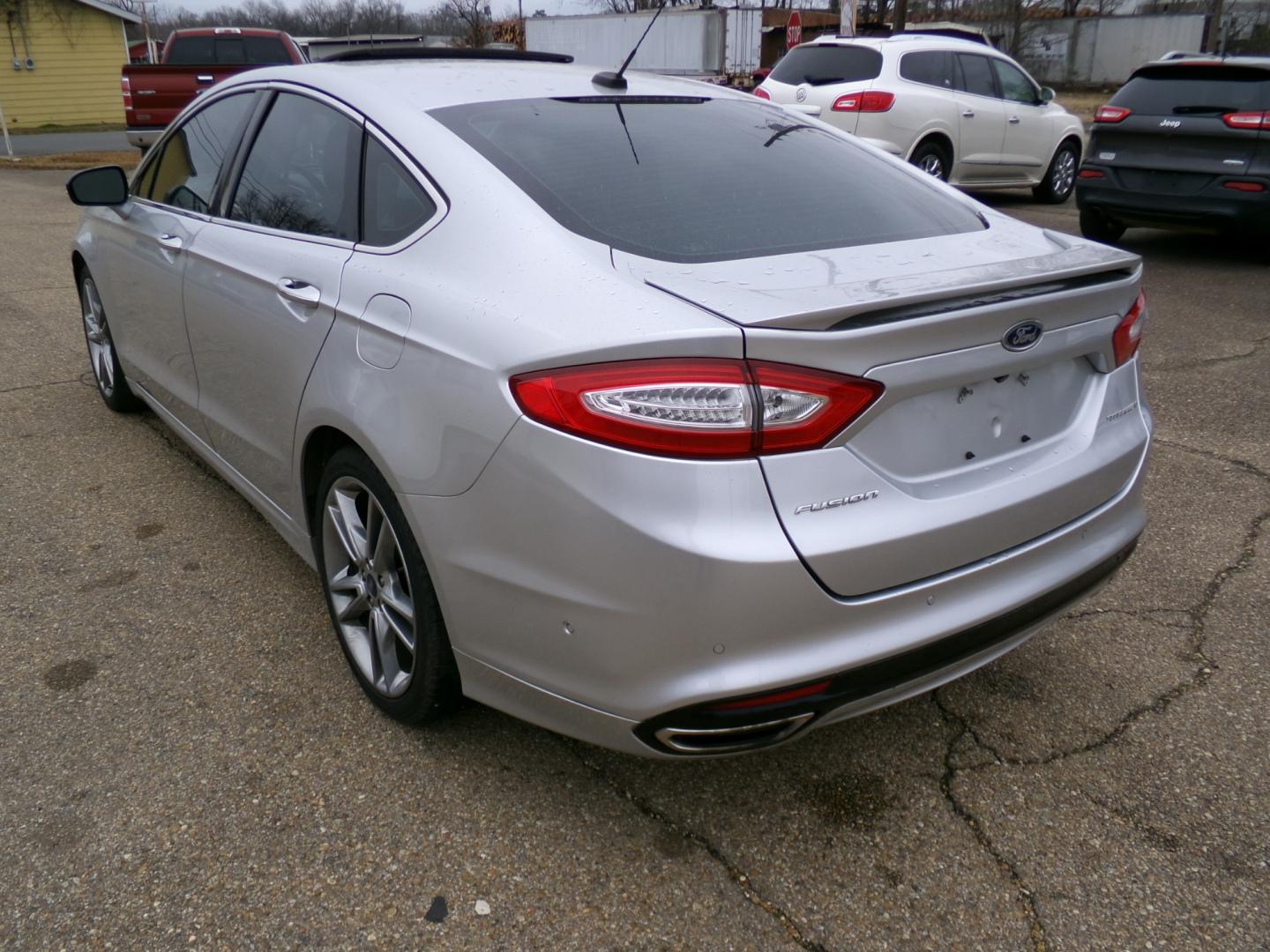 2013 Silver /Black Ford Fusion Titanium (3FA6P0K97DR) with an 2.0L L4 DOHC 16V engine, automatic transmission, located at 401 First NE, Bearden, AR, 71720, (870) 687-3414, 33.726528, -92.611519 - Photo#2